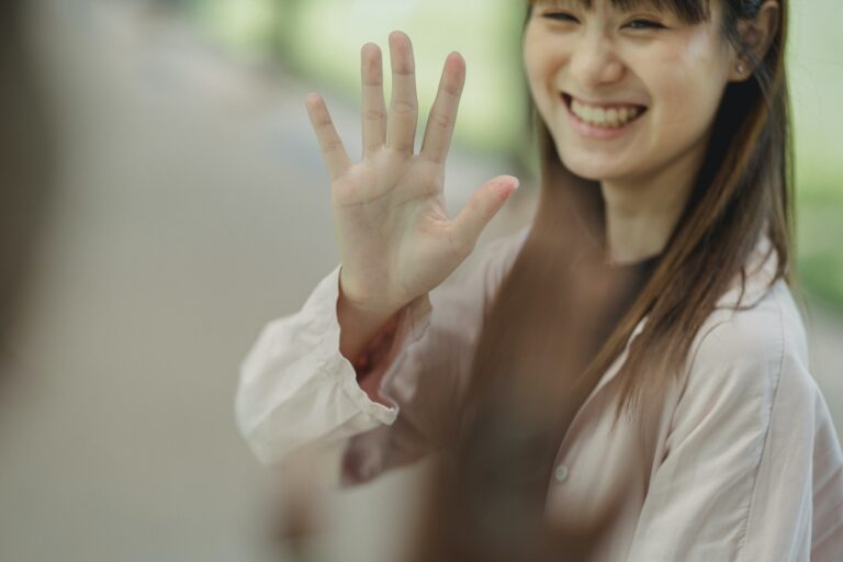 Smiling Woman Waving