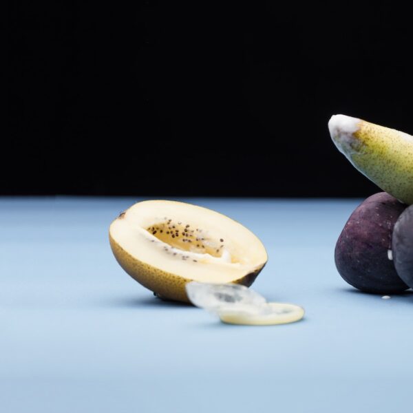 Sliced Lemon and Green Fruit