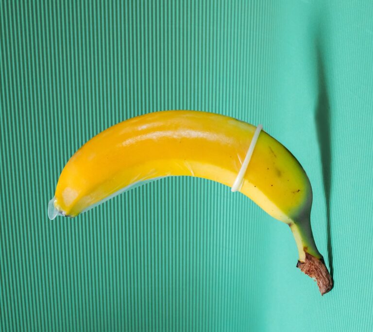 yellow banana fruit on green textile